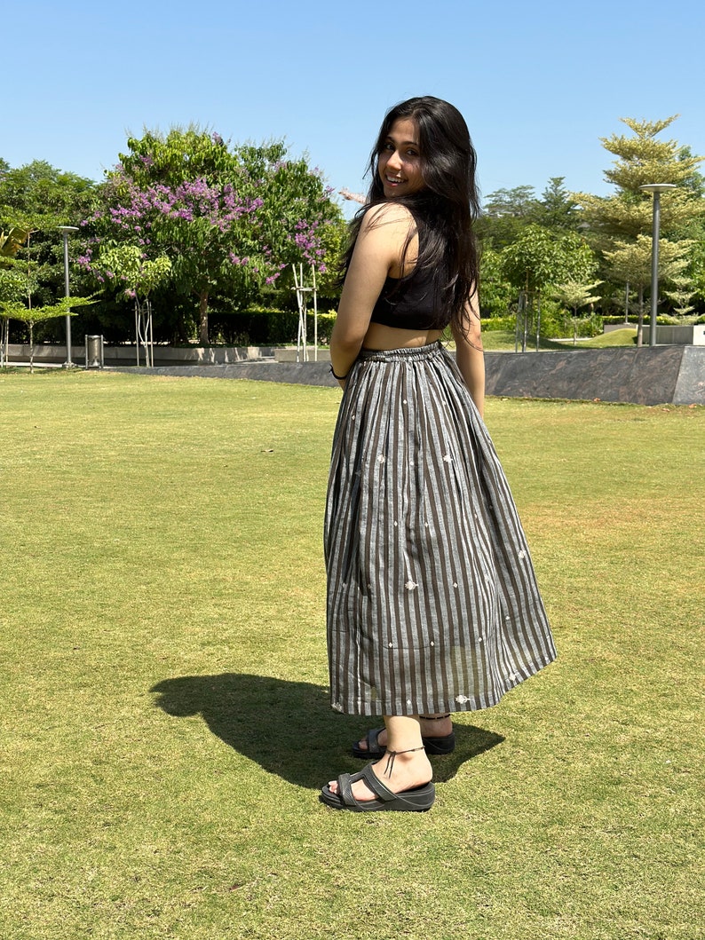 The Breeze Skirt is a handwoven summer garment from Fulia, handwoven cotton, featuring pocket and flowing length for effortless movement. image 3