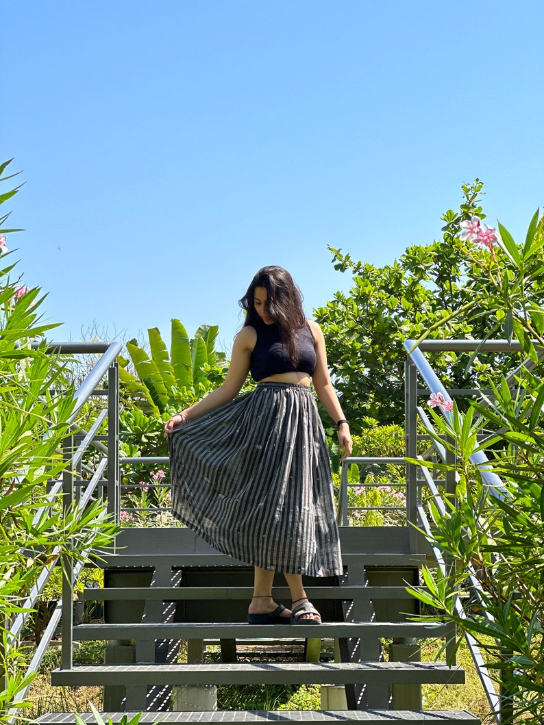 The Breeze Skirt is a handwoven summer garment from Fulia, handwoven cotton, featuring pocket and flowing length for effortless movement. image 8