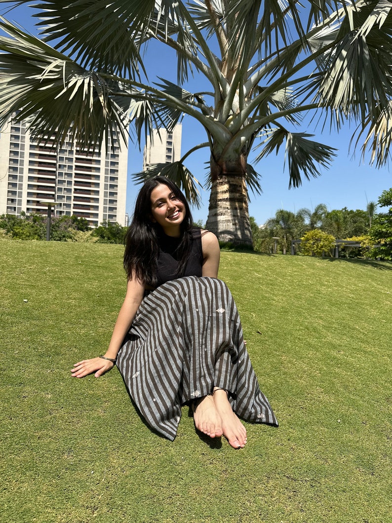 The Breeze Skirt is a handwoven summer garment from Fulia, handwoven cotton, featuring pocket and flowing length for effortless movement. image 4