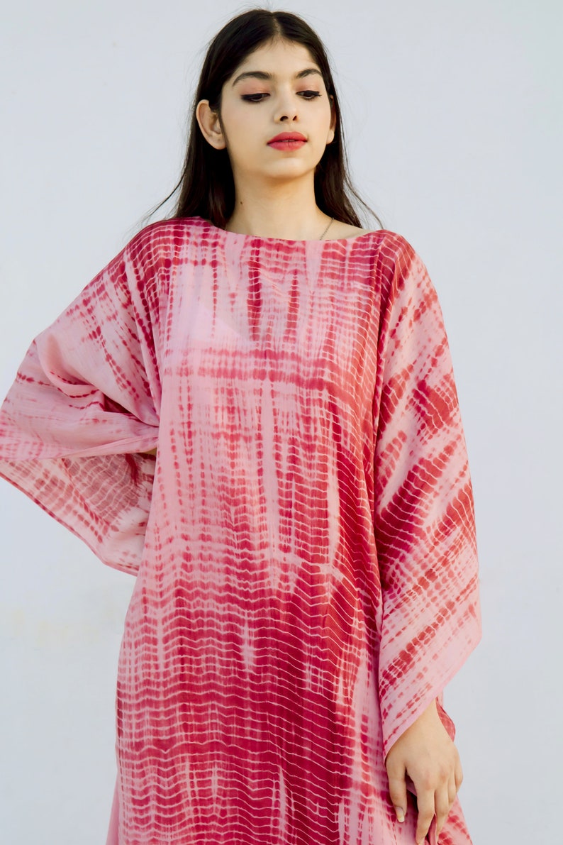 The KOSH Aloe Kaftan, featuring Shibori, a dyeing technique, transforms into a serene lullaby, offering comfort and mordernity. image 1