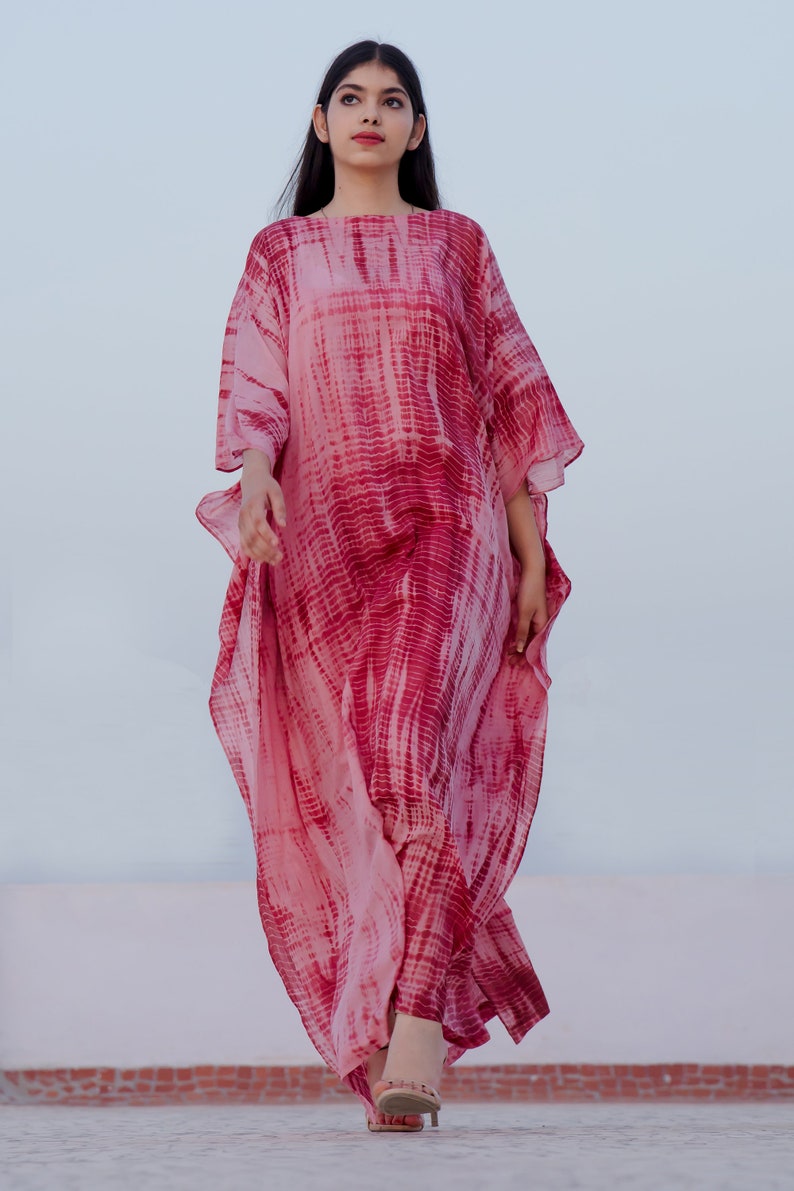 The KOSH Aloe Kaftan, featuring Shibori, a dyeing technique, transforms into a serene lullaby, offering comfort and mordernity. image 5