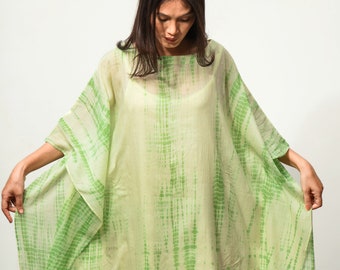 The KOSH Aloe Kaftan, featuring Shibori, a dyeing technique, transforms into a serene lullaby, offering comfort and mordernity.