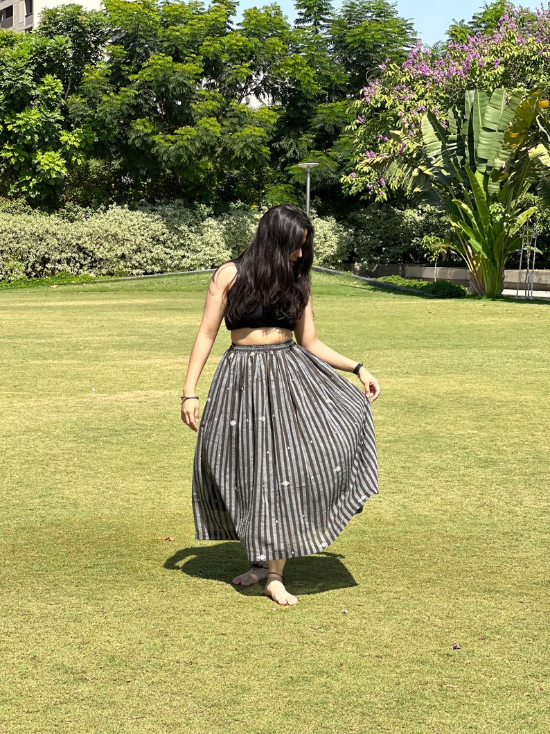 The Breeze Skirt is a handwoven summer garment from Fulia, handwoven cotton, featuring pocket and flowing length for effortless movement. image 6