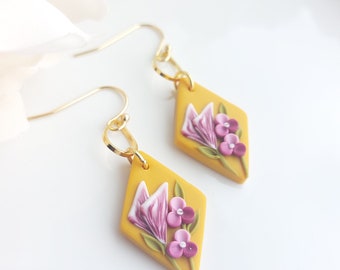 Boucles d'oreilles fleuries jaunes et fleurs roses