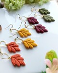 Leaf earrings made from polymer clay- Available in Yellow, Olive, Burgundy, Oat and Pumpkin product logo