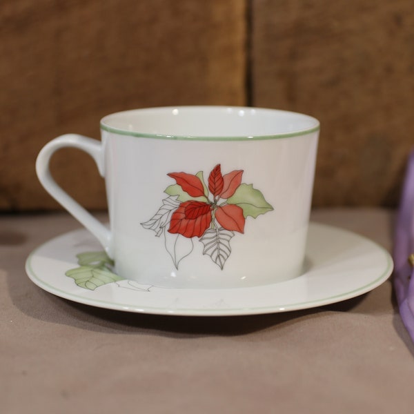 Block Spal Watercolors Poinsettia cups & saucers by Mary Lou Goertzen. Made in Portugal. Edged in Green. Excellent condition.