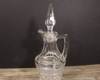 Cruet & Stopper Cape Cod Clear (1602 + 160) by Imperial Glass- Ohio. Discontinued  1932-1984   7 3/8 inches tall.