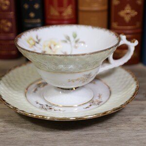 Cherry China Vintage Tea Cup and Saucer, Fine Bone China. Beautiful Yellow flowers, Yellow and White with Gorgeous Gold Trim.