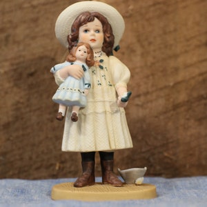 Emily  Limited Edition Numbered Porcelain Figurine by Jan Hagara. Numbered 1984-1985 Edition. B & J Art Designs. Dist. By Royal Orleans.