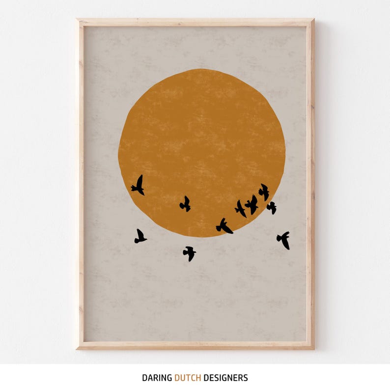 The left art poster with bright orange sun and flock of birds