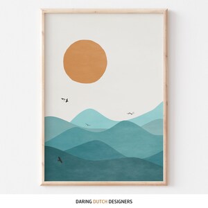 May include: Abstract art print featuring a large orange sun and a series of blue and teal hills with black birds flying over them. The print has a white background and the text "DARING DUTCH DESIGNERS" at the bottom.