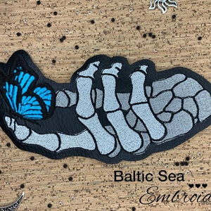 Embroidery file &quot;Bone Hand with Butterfly&quot; 86.3mm * 153.6mm