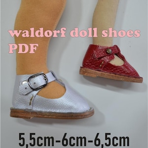 May include: A pair of doll shoes, one silver and one red, with a buckle closure. The shoes are made of leather and have a brown sole. The shoes are 5.5cm-6cm-6.5cm in size. The image also includes the text "waldorf doll shoes PDF".