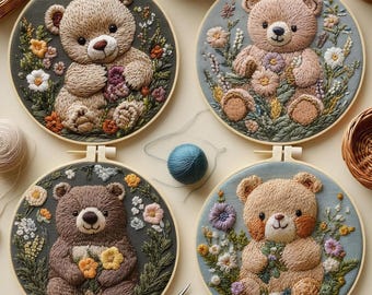 May include: Four embroidered teddy bear hoops. Each features a detailed bear surrounded by colorful flowers and foliage. The bears are in various shades of brown and tan, set against a muted background. The hoops are displayed on a light-colored surface.