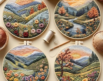 May include: Four circular embroidery hoops displaying landscape scenes. Each depicts a sunset, mountains, and colourful flowers. The embroidery uses shades of blue, green, orange, and yellow. A spool of thread and a needle are also visible.