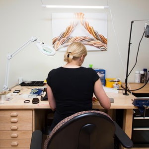 Heartstrings designer, Michelle, working at her workbench