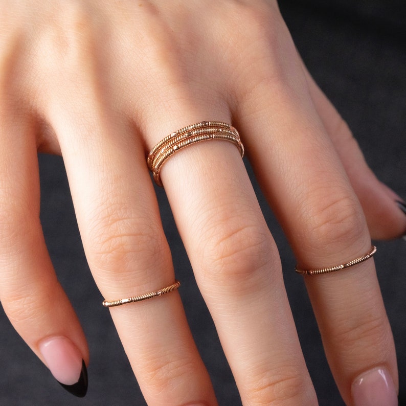 stacking duo guitar string rings on hand model