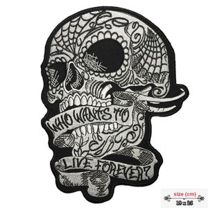 May include: Black and white embroidered iron-on patch featuring a skull with intricate details and a banner that reads "Who wants to live forever?" The patch measures 19 inches by 25 inches.