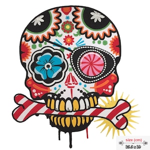 May include: A colorful sugar skull with a candy cane in its mouth. The skull has a black eye patch with a pink and white candy design. The skull is decorated with flowers and other patterns. The size of the skull is 25.5 x 29 cm.