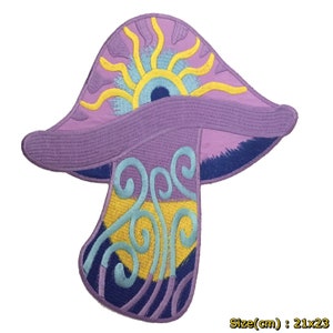 May include: Purple and yellow embroidered mushroom patch with a blue eye and sun design. The patch measures 21 by 23 centimeters.