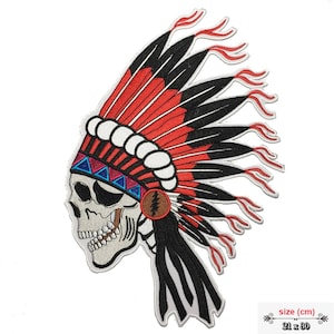 May include: Embroidered iron-on patch featuring a skull wearing a red, white, and black Native American headdress. The patch measures 21 inches by 30 inches.