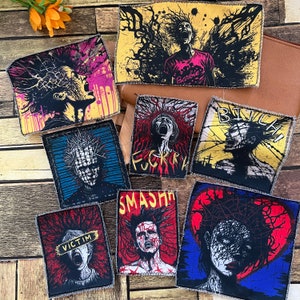 Könnte beinhalten: Neun Bügelbilder mit verschiedenen Designs, darunter ein Schädel mit Dornen, eine Figur mit einer Dornenkrone und eine Figur mit einer Dornenkrone und dem Wort "SMASHIN".
