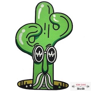 May include: A green embroidered patch depicting a cartoon cactus character with glasses and a mustache. The patch measures approximately 20 x 30 cm. The design features black outlines and white accents, creating a whimsical aesthetic.