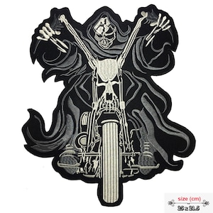 May include: Embroidered patch featuring a grim reaper riding a motorcycle. The design is primarily black and white, with the reaper's skeletal face and hands in white. The motorcycle is detailed with white accents, and the reaper is draped in a flowing black cloak.