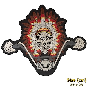 May include: Embroidered iron-on patch featuring a skull wearing a Native American headdress and riding a motorcycle. The patch is black with red, white, and brown accents. Size: 27 x 23 cm.