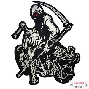 May include: Black and white embroidered patch of the Grim Reaper riding a motorcycle. The Reaper is holding a scythe and has red eyes. The patch is 25 x 29 cm.