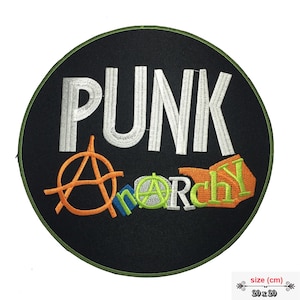 May include: A black and green circular embroidered patch with the word "PUNK" in white and the word "Anarchy" in orange, green, blue, and white. The patch is 20 cm by 20 cm.