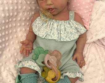 Reborn-docka helt i silikon (flaskmatningssystem ingår)