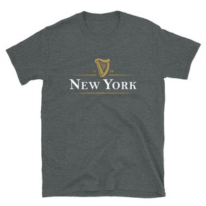 May include: A dark heather grey t-shirt featuring a gold harp logo and the text "NEW YORK" underneath. The harp logo has the numbers "17" and "89" on either side.