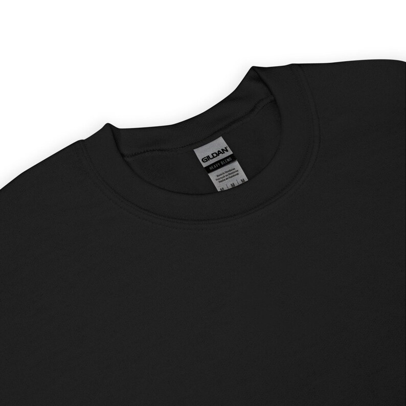 May include: Black Gildan Heavy Blend crew neck sweatshirt.