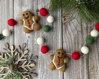 La Navidad se sintió con guirnalda. Guirnalda de pan de jengibre. Fieltro Gingerbread Man Garland. Felt Pom Poms Garland.Felt pomp-poms Garland. Guirnalda de Pompón de fieltro