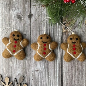 ADORNOS NAVIDEÑOS. Adornos de fieltro - Pan de jengibre de fieltro. Adornos navideños. Adornos navideños.