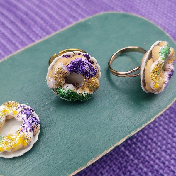 Tiny Frosted King Cake ring On a Plate