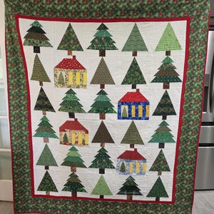 Christmas Cabins in the Woods throw quilt,  64.5 x 74.5 inches.