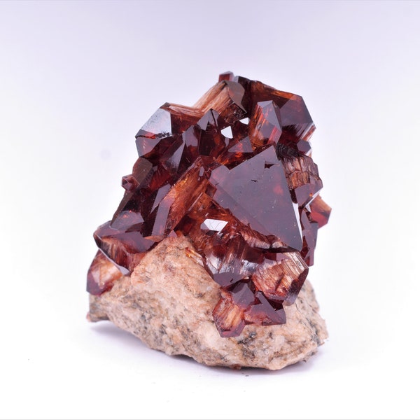 Arcanite crystals on matrix, brown cluster like garnet hessonite or spessartine