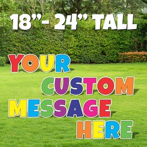 May include: Colorful, oversized yard letters spelling "YOUR CUSTOM MESSAGE HERE" in a rainbow color scheme. The letters are 18-24 inches tall.