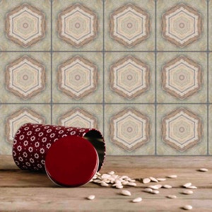 May include: A red and white patterned tin can with a red lid is open and spilling white seeds onto a wooden surface. The tin can is sitting in front of a wall with a repeating pattern of hexagonal tiles.