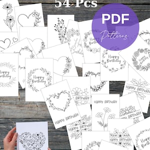 May include: A collection of 54 US Letter size foldable PDF patterns featuring black and white line art illustrations of flowers, hearts, and wreaths with the text Happy Birthday. The designs are printed on white paper sheets for colouring.