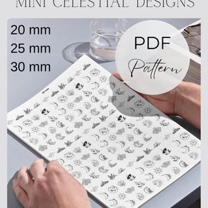 May include: A white sheet of paper featuring 20 PCS MINI CELESTIAL DESIGNS, PDF Pattern, and Printable Hand Embroidery Patterns. The sheet displays multiple black line art illustrations of moons, stars, and moths in 20 mm, 25 mm, and 30 mm sizes.