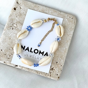 Snäckskalarmband med pärlblommor tillverkade av färgglada rospärlor/glaspärlor/snäckskalspärlor/kauripärlor/kauriarmband/kaurisnäckskal/armband