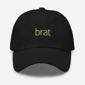 May include: A black baseball cap with the word "brat" embroidered in green on the front.