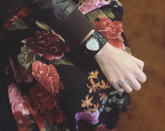 Leather and mother-of-pearl cuff