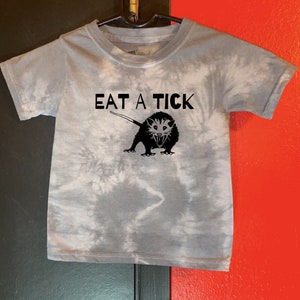Eat a Tick Toddler Tee by 101 Damnations Shop (Possum Opossum Trash Kitty)
