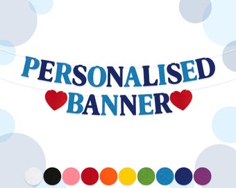 May include: Personalized banner with blue and white letters spelling "PERSONALISED BANNER" with two red hearts on either side of the word "BANNER".