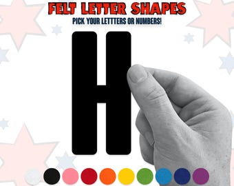 May include: Black felt letter H,  felt letter shapes, pick your letters or numbers