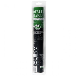 May include: A roll of black Sulky Totally Stable Tear-Away Stabilizer. The packaging is white with green text and a green and white iron icon. The text on the packaging reads "Totally Stable 10in. Tear-Away Stabilizer" and "Create with Confidence".